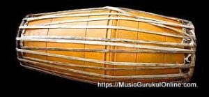 The mridangam is a percussion instrument of ancient origin primary rhythmic accompaniment in a Carnatic music ensemble.