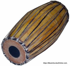 The mridangam is a percussion instrument of ancient origin primary rhythmic accompaniment in a Carnatic music ensemble.