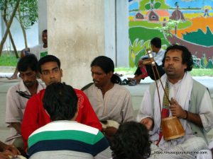 Some devotees are practicing Lalon songs near Lalon Shaijis Shrine Some devotees are practicing Lalon songs near Lalon Shaiji's Shrine